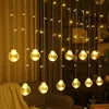 Guirlande rideau solaire LED à boules – Ambiance lumineuse extérieure